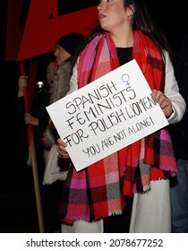 Krakow, Poland - November 7 2021: Girl With Banner SPANISH FEMINISTS FOR POLISH WOMEN YOU ARE NOT ALONE While Support Protest Of Women Strike Movement, Against Anti Abortion Strict Law