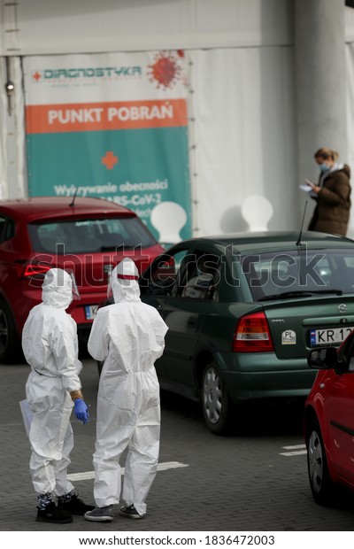 Krakow,\
Poland - October 10, 2020 : Red zone in Poland. A Giant car queue\
to perform tests - swabs for the presence of SARS-CoV-2 coronavirus\
at the collection point of the Diagnostyka Group\
