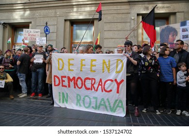 Krakow / Poland - October 12 2019: Demonstration Against Turkish Invasion In Syria, Activists And Local People With Flags Of  Autonomous Administration Of North And East Syria Called Rojava Also