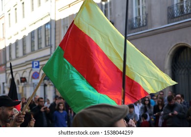 Krakow / Poland - October 12 2019: Flag Of  Autonomous Administration Of North And East Syria, Known As Rojava  During Demonstration Against Turkish Invasion In Syria