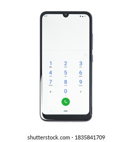 Krakow, Poland - October 16, 2020:  Numbers Dialing Keypad Screen On MOTOROLA Moto E6 Plus In Close-up On A White Background