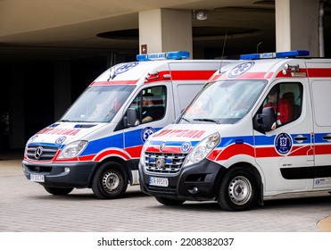 Krakow, Poland - September 2022: Krakow, Poland, Two Polish Ambulances, Emergency Service Vehicles Parked, Side View. Emergency Response Transport, Ambulance Parking, Public Safety Services Concept