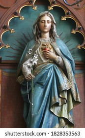 KRAPINA, CROATIA - JULY 01, 2013: Immaculate Heart of Mary statue on the altar of the Immaculate Heart of Mary in the parish church of Saint Nicholas in Krapina, Croatia