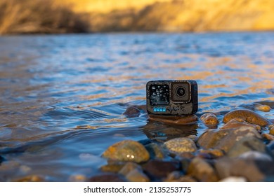 Krasnodar, Russia - March 03 2022: GoPro 10 In The Splashing Water On The River. Action Camera In Extreme Conditions, The Splatter On The Camera.