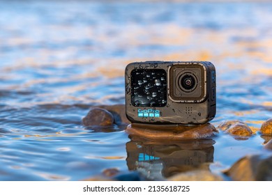 Krasnodar, Russia - March 03 2022: GoPro 10 In The Splashing Water On The River. Action Camera In Extreme Conditions, The Splatter On The Camera.