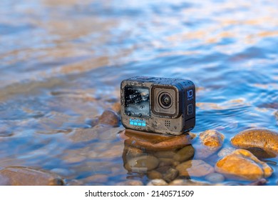 Krasnodar, Russia - March 03 2022: GoPro 10 In The Splashing Water On The River. Action Camera In Extreme Conditions, The Splatter On The Camera.