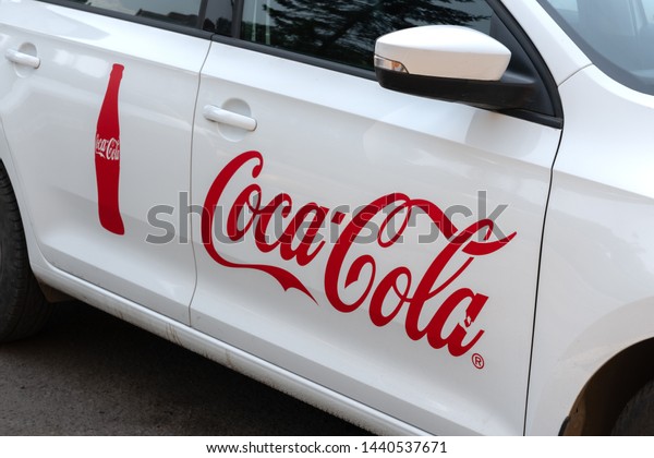 Krasnoyars, Russia, 3 july 2019: Coca Cola Company\
Car The Russia. logo on the\
door