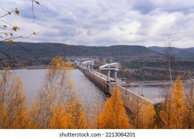 Krasnoyarsk Hydroelectric Power Plant Top View In Autumn. Reservoir And Water Discharge Mines