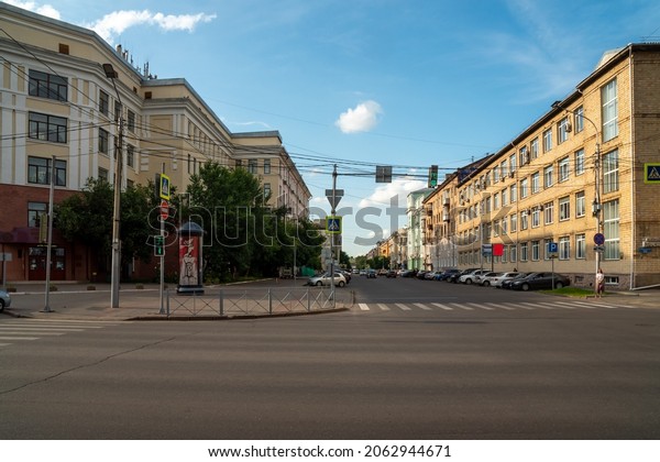 Krasnoyarsk, Krasnoyarsk Region, RF - July\
19, 2021: View of Dekabristov Street from Karl Marx Avenue with the\
Medical University at the corner on a summer\
day.