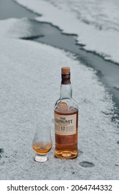 Krasnoyarsk, Russia - 04.17.2017 A bottle of Glenlivet Single Malt Scotch Whisky located on ice