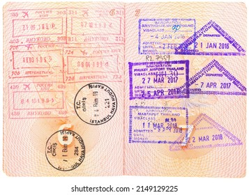 Krasnoyarsk, Russia - April 8, 2022:Opened Depersonalized Russian Passport With Stamps On Border Crossing. Departure And Arrival Immigration Stamps. Passport Page With The Immigration Control