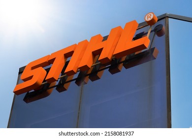 Krasnoyarsk, Russia - May 18, 2022: Stihl logo on the facade of the building. Stihl dealership. German manufacturer of chainsaws and other handheld power equipment including trimmers and blowers