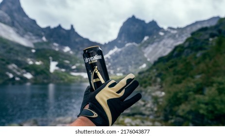 Krasnoyarsk, Russia-June 25, 2021: Adrenaline Rush Energy Drink.  Background Of Mountains