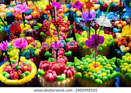 Krathong made from fish food for thai people select buy into float ritual vessel at river for forgiveness from Ganges angel or Khongkha Goddess of water in Loy Krathong festival in Nonthaburi Thailand