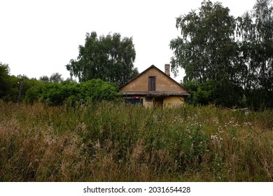 Kremlevo, Russia - August 12, 2021. Building Of A Closed Cottage Hospital And A Voting Place In A Rural Area. Cloudy Summer View.