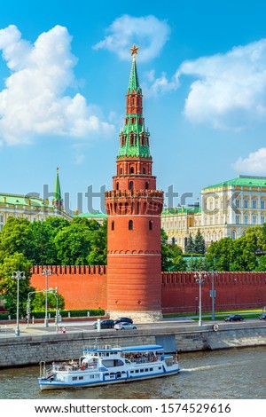 Kremlin across Moskva river with excursion boat, Moscow, Russia