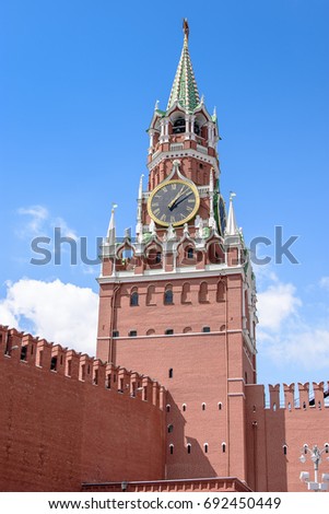 Kremlin clock tower, with a red star on the tower.