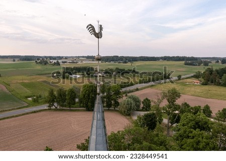 Krimulda Evangelical Lutheran Church tower with rooster, close-up, Latvia, aerial view