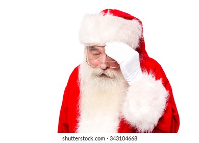 Kris Kringle Holding His Head In Headache