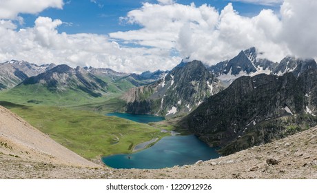 Krishnasar and Vishnusar lakes on the Kashmir great lakes trek in Kashmir, India. Amazing beauty of Nature.  Blue sky and white clouds. Wanderlust, hiking, view from highest of the mountain