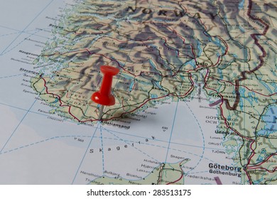 Kristiansand Marked With Red Pushpin On Map. Selected Focus On Kristiansand And Bright Red Puspin. Pushpin Is In An Angle. Southern Parts Of Norway Can Be Seen On Map.