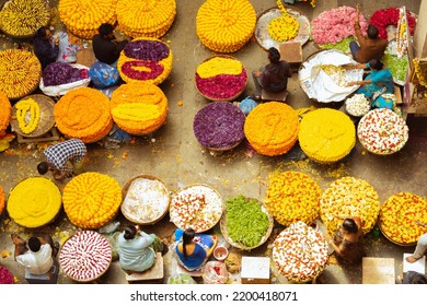 K.R.Market,Bengaluru, India -14-08-2022:Top View Of Biggest Flowers Market K.R.Market. Flower Vendors Selling Flowers