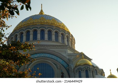 Kronstadt Naval Cathedral Against The Blue Sky. The Dome Of The Cathedral With Golden Crosses.Architecture Of The City Of Kronstadt. 12.08.2021 Kronstadt.