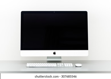 Krynica - Zdroj, POLAND - August 19 , 2015: Photo of new iMac Retina 5k, With OS X Yosemite on table in office. iMac - monoblock series of personal computers, created by Apple Inc.