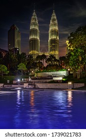 KUALA LUMPUR, 17 August 2013 - Illuminated fountain in the KLCC Sauria park in front the Petronas twin towers at night