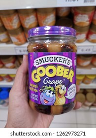 Kuala Lumpur, 18 December 2018:  Holding A Jars Of Smucker's Brand Goober. Peanut Butter And Jelly Mixed In The Same Jar.