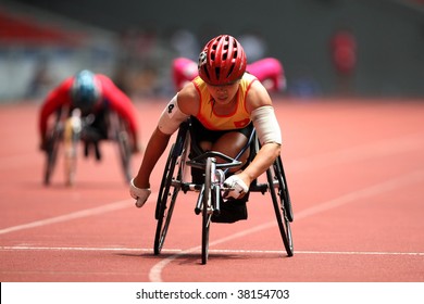 KUALA LUMPUR - AUGUST 15: Vietnam's Wheel Chair Athlete Leads The 800m Race At The Track And Field Event Of The Fifth ASEAN Para Games On August 15, 2009 In Kuala Lumpur.