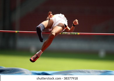 KUALA LUMPUR - AUGUST 16: Amputee high jump athlete in a successful jump at the track and field event of the fifth ASEAN Para Games on August 16, 2009 in Kuala Lumpur, Malaysia.