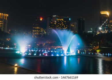 KUALA LUMPUR - AUGUST 2019 : Lake Symphony Water Fountain Show at the esplanade outside of Suria KLCC during night time.