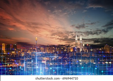 kuala lumpur city skyline , night scene with digital line - Powered by Shutterstock