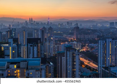 Kuala Lumpur cityscape at dawn, viewed from Mont Kiara, east of Kuala Lumpur, Malaysia - Powered by Shutterstock