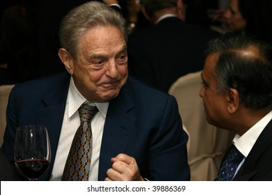 KUALA LUMPUR - DECEMBER 15: George Soros Talking To Former Malaysian Finance Minister Nor Mohamed Yakcop At The London School Of Economics Alumni Dinner December 15, 2006 In Kuala Lumpur, Malaysia.