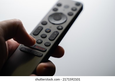 Kuala Lumpur - June 26th 2022 : A premium minimalist SONY Android TV remote commander with Google Voice (OK Google) function and quick access button to Netflix, Disney+ and Prime Video button