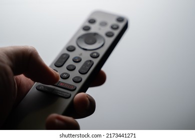 Kuala Lumpur - June 26th 2022 : A premium minimalist SONY Android TV remote commander with Google Voice (OK Google) function and quick access button to Netflix, Disney+ and Prime Video button