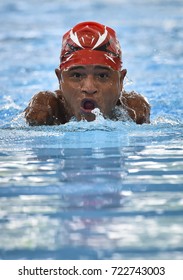 KUALA LUMPUR, MALAYISA - SEPTEMBER 20, 2017 : Disabled Swimmer Athlete Without Hand In The Breatstroke Event During 9th Para ASEAN Games 2017 At Bukit Jalil Aquatic Centre.