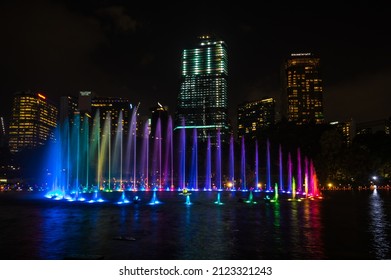 KUALA LUMPUR, MALAYSIA - 03 FEBRUARY, 2020: Colorful dancing fountain in KLCC Park in Kuala Lumpur, the capital city of Malaysia