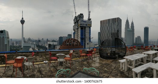 KUALA LUMPUR, MALAYSIA - 11/13/2019: Rooftop Bar With Amazing View Over Kuala Lumpur's Skyline Remains Empty After Heavy Rainfall