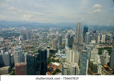 Kuala Lumpur, Malaysia - 13 OCTOBER 2017: Aerial view of Kuala Lumpur city skyline during bright day.