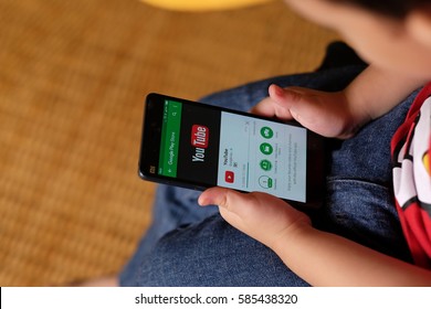 Kuala Lumpur, Malaysia - 14 Feb : Kid Watching Youtube On Smartphone. Smartphone Safety For Kids Is Now A Big Concern For Parents.