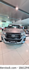 Kuala Lumpur, Malaysia- 16 Nov, 2020: Toyota Service Centre Workshop Receptionist Counter With Toyota Hilux New Car Display