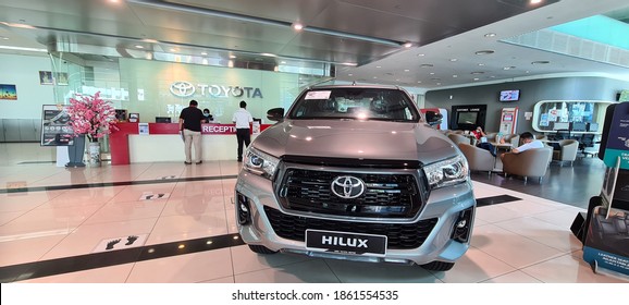 Kuala Lumpur, Malaysia- 16 Nov, 2020: Toyota Service Centre Workshop Receptionist Counter With Toyota Hilux New Car Display