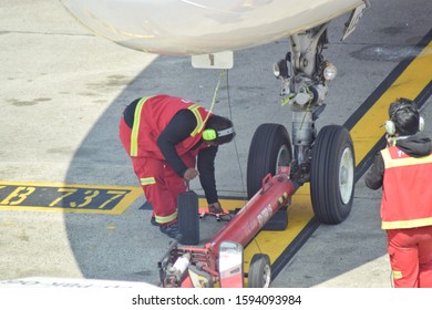 Kuala Lumpur, Malaysia. 20 December 2019 - Airport Staff Doing Preparation Before Flight From Air Asia Take Off From KLIA Airport.