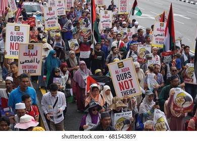 KUALA LUMPUR, MALAYSIA - 21st July 2017 : Protesters gather to protest the closure of Al-Aqsa Mosque and holding banners "Save Palestine" "Free Al-aqsa" against Israeli Government's. 