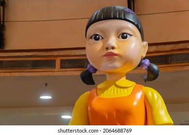 KUALA LUMPUR, MALAYSIA - 24 OCTOBER, 2021 : Giant doll from Squid Game at the roadshow for the promotion of new Netflix show. Squid Game is a South Korean survival drama television series