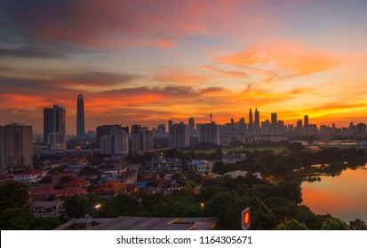 KUALA LUMPUR, MALAYSIA - 25 AUGUST 2018 : View of the mega city Kuala Lumpur cityscape and skyscraper towers at sunset.