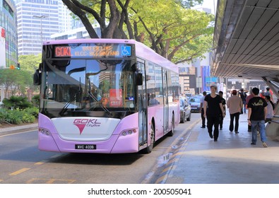 KUALA LUMPUR MALAYSIA - 25 May, 2014:Free Public Transport GOKL Bus Runs Near Petronas Tower. GOKL Free Bus Was Launched To Improve Public Mobility In The Area Of KLCC, Bukit Bin Tang And China Town 